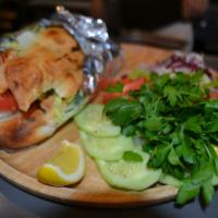 Salmon Sandwich · Homemade bread. Comes with red cabbage, iceberg lettuce, tomato, onion, parsley, olive oil a...