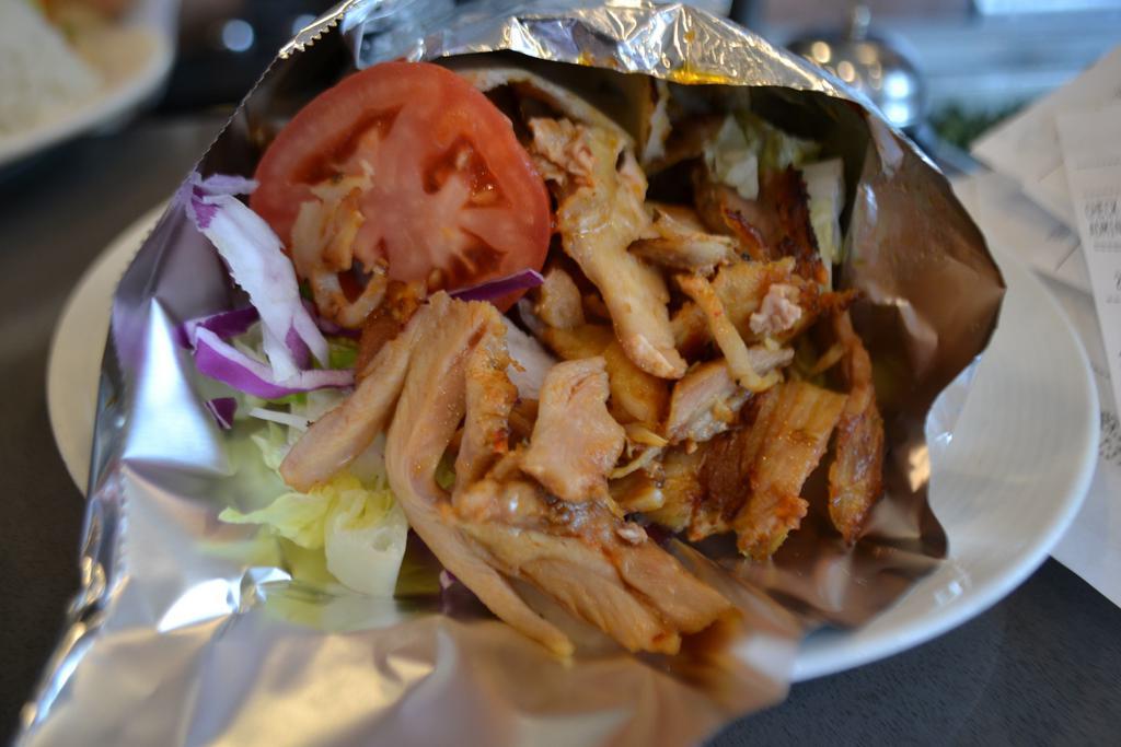 Chicken Gyro Sandwich · Comes with red cabbage, iceberg lettuce, tomato, onion, parsley, olive oil and lemon juice.