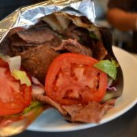 Doner Sandwich · Gyro. Comes with red cabbage, iceberg lettuce, tomato, onion, parsley, olive oil and lemon j...