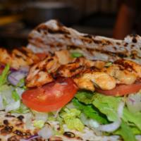 Chicken Shish Kebab Wrap · Tender cubes of chicken marinated in our chef's unique seasonings and char-grilled to perfec...