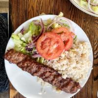 Adana Kebab · Ground lamb flavored with red bell peppers slightly seasoned with paprika and grilled delici...