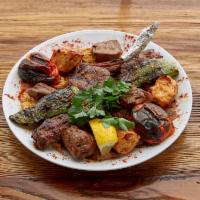 Mixed Grill · 4 different kebabs in 1 dish. An inviting combination of shish kebab, Adana kebab, gyro keba...