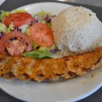 Chicken Adana · Chicken grilled on skewers chicken flavored with red bell peppers, gently spiced with paprik...