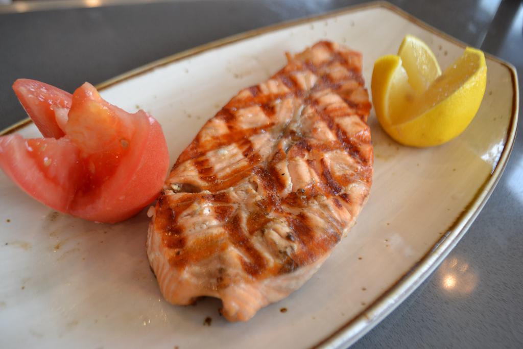 Salmon on Skewers · Cubes of char-grilled salmon. Served with salad and rice.