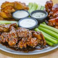 6 Pieces Wings · Tossed in your choice of sauce, served with celery and ranch or blue cheese.