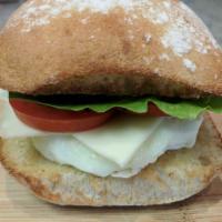Mediterranean Sandwich · Freshly made egg whites on a bagel, wrap or ciabatta roll with butter, cheese, lettuce and t...
