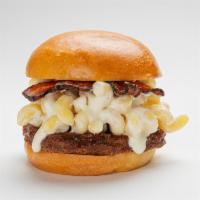 Bacon Mac Burger · A beef burger with American cheese, crispy bacon and creamy mac n cheese.