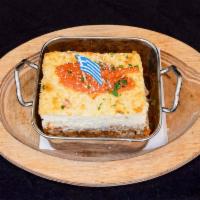 Pastichio · Baked pasta dish with ground beef and creamy béchamel sauce. 
The Greek version of Lasagna.