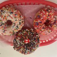 Topping donuts · sprinkle, chocolate chip, Oreo, M&M, coconut, cinnamon sugar, powder sugar, cinnamon crumb 