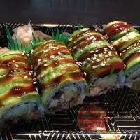 S18. Green Dragon Roll · Broiled eel and cucumber inside with avocado and tobiko on top.