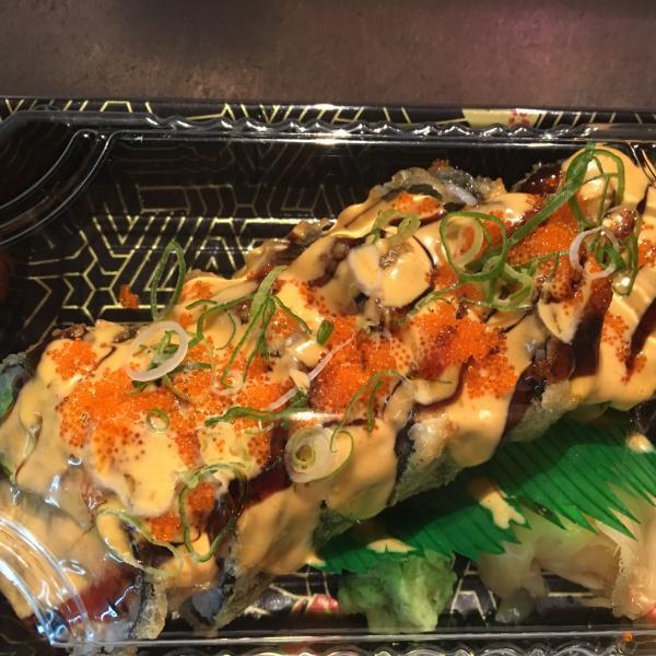 Volcano Roll · Tuna, salmon, white fish, crab, tobiko and avocado fried with spicy sauce. 