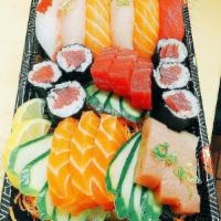C17. Sushi and Sashimi Combo · Six pieces of sushi, five piece of sashimi and one tuna roll.