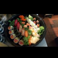 Sushi Party Platter B · East roll, tuna roll and California roll. Two pieces each of tuna, eel, salmon, red snapper,...