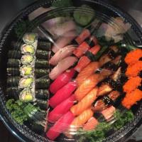 Sushi Party Platter C · Tuna roll, salmon roll, eel roll and California roll. Four pieces each of yellowtail, tuna, ...