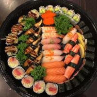 Sushi Party Platter D · Shrimp tempura roll, tuna roll, California roll, salmon roll, East roll. Three pieces each o...