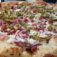 Cochino Chicken Pizza · Pesto chicken, red onions, hickory-smoked bacon and feta cheese crumbles.