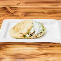 Gorditas · A flaky corn pastry filled with the protein of your choice accompanied with lettuce, tomato ...