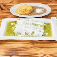Enchiladas · 3 Soft corn tortillas filled with the protein of your choice, submerged in one of our savory...