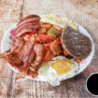 1. Hungry Ham · Bacon, or ham, or sausage, 3 eggs, cheese, home fries, and toast.