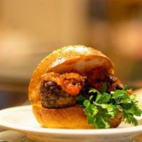 Meatball Sub Sandwich · A hoagie bun stuffed with juicy meatballs, flavorful marinara, all topped with mozzarella. 
