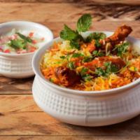 Hyderabad chicken Dum Biryani Small Shallow(Take out only) · Traditional Hyderabadi style Biryani with chicken on the bone cooked with long grain basmati...