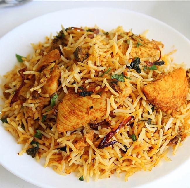 Samuha Spl Chicken fry Biryani Small Shallow (take out only). · Fried Boneless Chicken cooked in basmati rice over a low fire with Indian herbs.