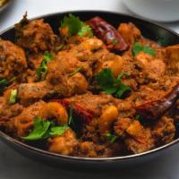 Chicken Chukka. · Authentic Chettinad dish made of roasted boneless chicken with fresh spices & herbs.