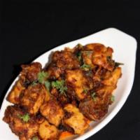 Chicken Vepudu. · Popular Andhra dish with dry boneless chicken roasted with spices and herbs.
