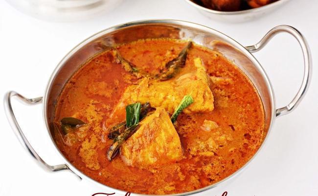 Malabar Fish Curry. · Chunks of Boneless fish cooked in a Kerala style with coconut and curry leaves-based gravy.