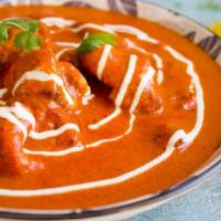 Chicken Tikka Masala. · Boneless chicken cubes cooked in a rich creamy onion and tomato-based gravy.