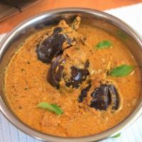Gutti Vankaya Curry. · Popular Andhra dish made with Eggplant stuffed with spices and cooked to perfection.