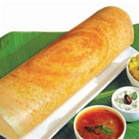 Masala Dosai. · Classic South Indian thin crispy crepe filled with spiced mashed potatoes and onions.