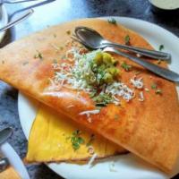 Cheese Masala Dosai. · thin crepe made of rice & lentil filled with shredded cheese and Potato masala.