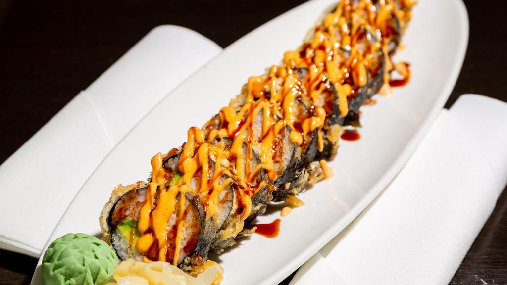 Kamikazi Roll · Spicy tuna, crabstick, avocado, deep fried, with spicy mayo, and eel sauce. 