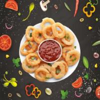 Onion Rings · Seasoned onion rings batter-fried crisp and golden.