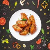 Beyond Wings · Bone-in traditional chicken wings in a choice of buffalo, sweet chili garlic, or our signatu...