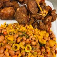 Fried Pork Chunk Meal ·  yellow rice with beans fried sweet plantains 