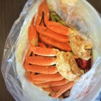 Snow Crab Boil · Snow crab, shrimp,mussels, crawfish, corns, potatoes.
Choose your sauce: butter garlic, Caju...