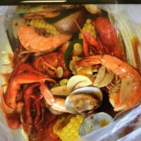 Seafood Boil · Crawfish, shrimp, mussels, corns, potatoes.Choose your sauce: butter garlic, Cajun ,old bay ...