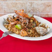 Chaufa de mariscos · Cantonese Fried rice with shrimp, calamari, crab-meat, mussels and clay 