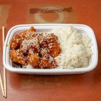 S21. Sesame Chicken · Chunks of chicken deep-fried crispy with spicy Hunan sauce surrounded bybroccoli. Hot and sp...