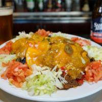 Fresh Cooked Nacho Platter · Fresh Made tortilla chips topped with melted cheddar cheese, beef chili, lettuce, tomato and...