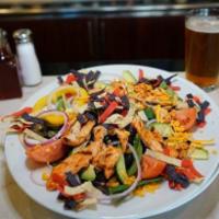 Tex-Mex Salad · Grilled spicy hot chicken breast with black beans, corn, shredded cheddar cheese, avocado an...