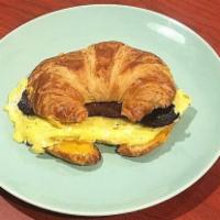 Turkey bacon, egg & cheese on croissant · 