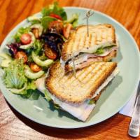 Turkey Sandwich · Turkey, Swiss cheese, tomato, hard boiled egg and mayo with side salad