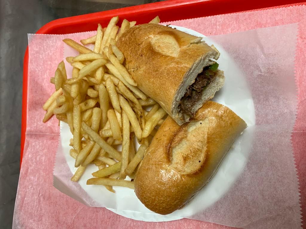 Philly Cheesesteak with Fries and Can Soda · Come with grill red onion and green pepper and May and ketchup with nicely toasted hero bread 😋😋😋