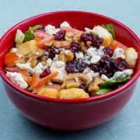 Cranberry Chicken Salad · Grilled chicken breast, blue cheese crumbles, walnuts, cherry tomato, cucumber, dried cherri...