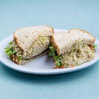 Classic Tuna Sandwich · Fresh house made Albacore tuna salad, lettuce, tomato and mayonnaise served on multi-grain s...