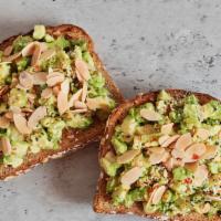 Avocado Toast · Toasted multi grain, mashed avocados, lemon juice, sliced almonds, pink Himalayan salt, blac...