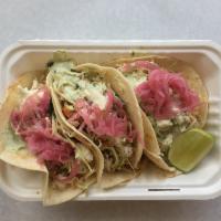 Fish Tacos · Cabbage slaw, chipotle aioli.